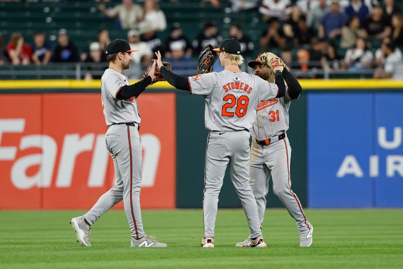 May 23, 2024; Chicago, Illinois, USA; Baltimore Orioles players celebrate after defeating the Chicago White Sox at Guaranteed Rate Field. Mandatory Credit: Kamil Krzaczynski-USA TODAY Sports