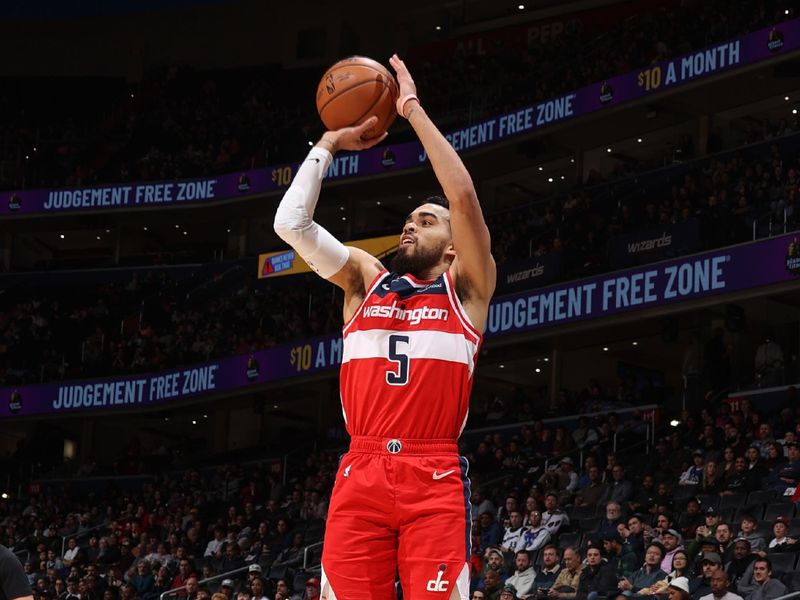 WASHINGTON, DC -? JANUARY 21:  Tyus Jones #5 of the Washington Wizards shoots a three point basket during the game  on January 21, 2024 at Capital One Arena in Washington, DC. NOTE TO USER: User expressly acknowledges and agrees that, by downloading and or using this Photograph, user is consenting to the terms and conditions of the Getty Images License Agreement. Mandatory Copyright Notice: Copyright 2024 NBAE (Photo by Stephen Gosling/NBAE via Getty Images)