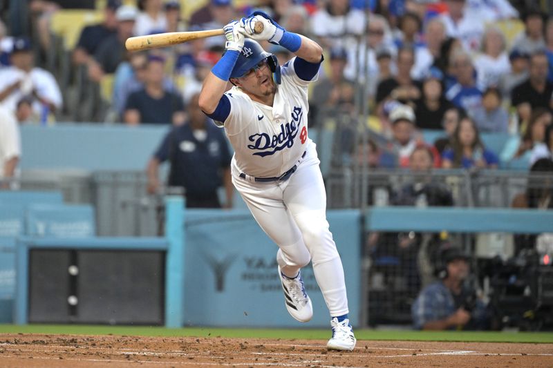 Aug 6, 2024; Los Angeles, California, USA;  Los Angeles Dodgers third baseman Enrique Hernandez (8) backs off an inside pitch in the second inning against the Philadelphia Phillies at Dodger Stadium. Mandatory Credit: Jayne Kamin-Oncea-USA TODAY Sports