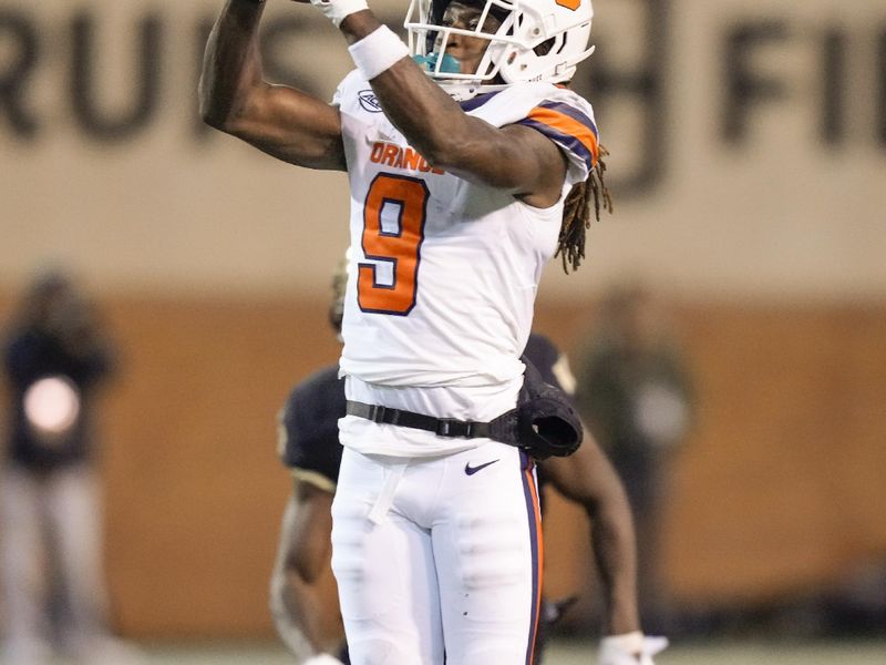 Nov 19, 2022; Winston-Salem, North Carolina, USA;  Syracuse Orange wide receiver Courtney Jackson (9) jumps up for the reception against the Wake Forest Demon Deacons during the second half at Truist Field. Mandatory Credit: Jim Dedmon-USA TODAY Sports