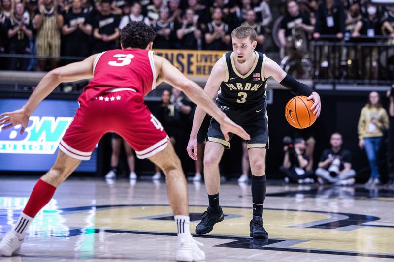 Feb 10, 2024; West Lafayette, Indiana, USA; Purdue Boilermakers guard Braden Smith (3) the ball while Indiana Hoosiers guard Anthony Leal (3) defends in the second half at Mackey Arena. Mandatory Credit: Trevor Ruszkowski-USA TODAY Sports