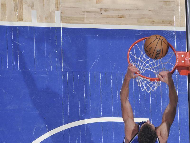 ORLANDO, FL - MARCH 23: Franz Wagner #22 of the Orlando Magic dunks the ball during the game against the Sacramento Kings on March 23, 2024 at the Kia Center in Orlando, Florida. NOTE TO USER: User expressly acknowledges and agrees that, by downloading and or using this photograph, User is consenting to the terms and conditions of the Getty Images License Agreement. Mandatory Copyright Notice: Copyright 2024 NBAE (Photo by Fernando Medina/NBAE via Getty Images)