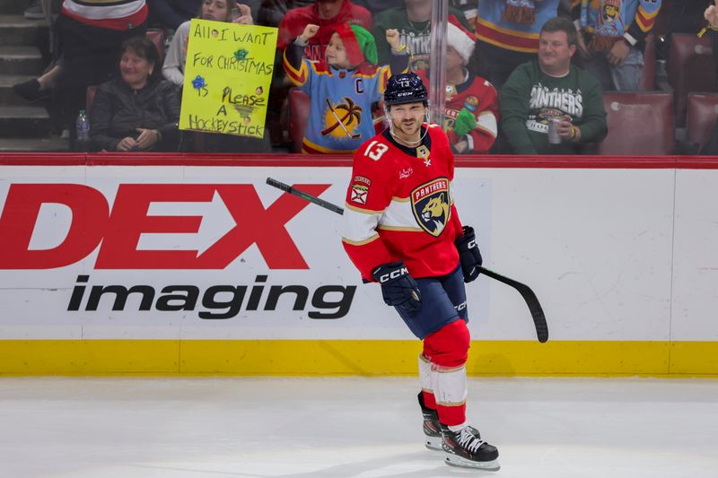 Dec 23, 2023; Sunrise, Florida, USA; Florida Panthers center Sam Reinhart (13) looks on after scoring against the Vegas Golden Knights during the third period at Amerant Bank Arena. Mandatory Credit: Sam Navarro-USA TODAY Sports