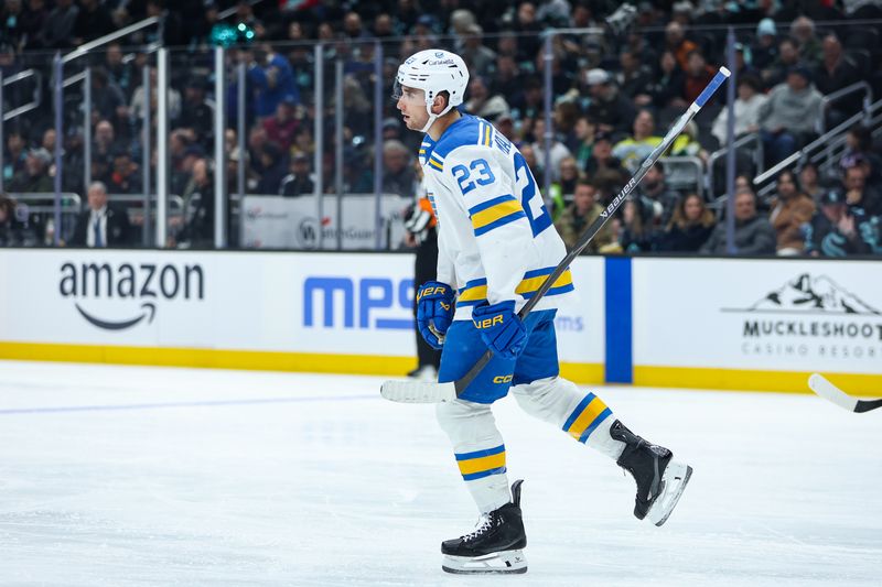 Mar 4, 2026; Seattle, Washington, USA; St. Louis Blues defenseman Logan Mailloux (23) reacts after scoring a goal in the first period against the Seattle Kraken at Climate Pledge Arena. Mandatory Credit: Kevin Ng-Imagn Images