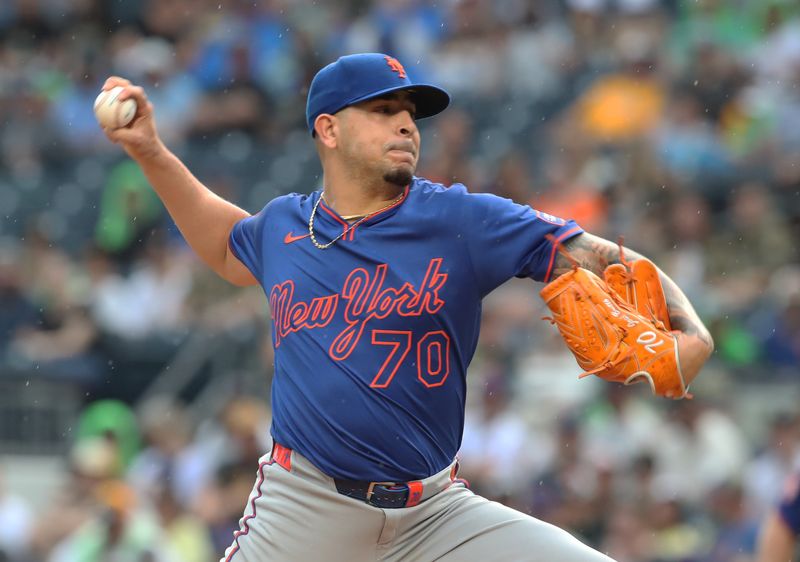 Jun 28, 2025; Pittsburgh, Pennsylvania, USA; New York Mets starting pitcher Jose Butto (70) pitches against the Pittsburgh Pirates during the second inning at PNC Park. Mandatory Credit: Charles LeClaire-Imagn Images
