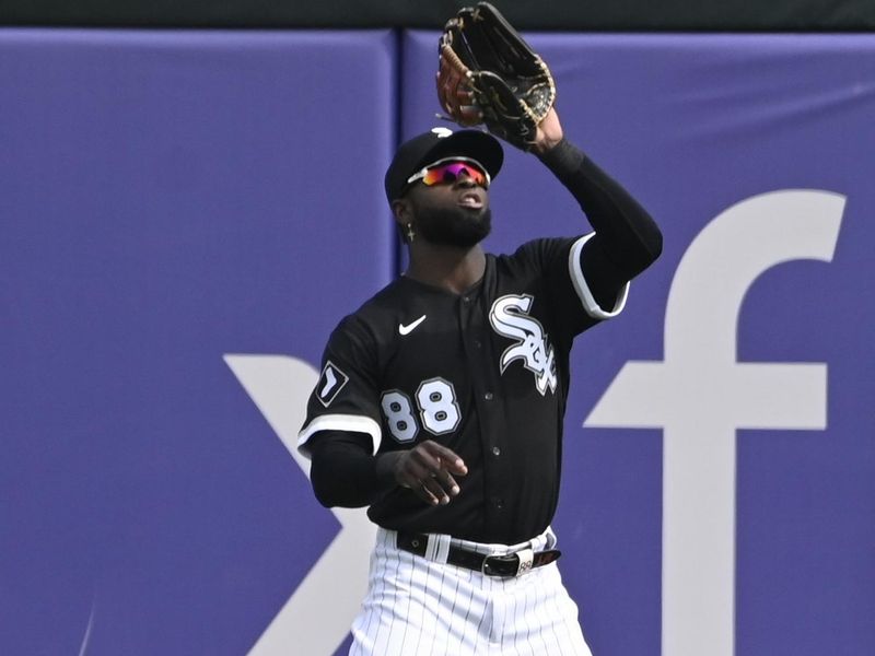 Jul 6, 2023; Chicago, Illinois, USA;  Chicago White Sox center fielder Luis Robert Jr. (88) catches a fly ball hit by Toronto Blue Jays right fielder George Springer (not pictured) during the first inning at Guaranteed Rate Field. Mandatory Credit: Matt Marton-USA TODAY Sports