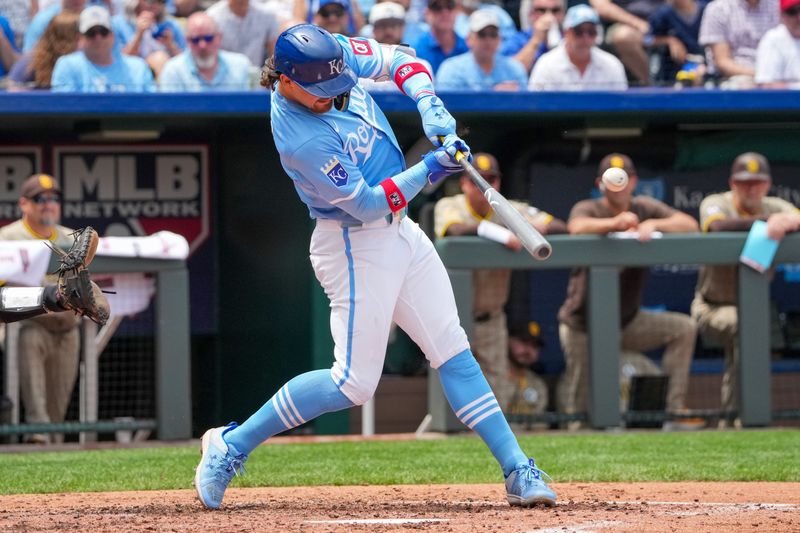 Jun 2, 2024; Kansas City, Missouri, USA; Kansas City Royals shortstop Bobby Witt Jr. (7) singles against the San Diego Padres in the fourth inning at Kauffman Stadium. Mandatory Credit: Denny Medley-USA TODAY Sports