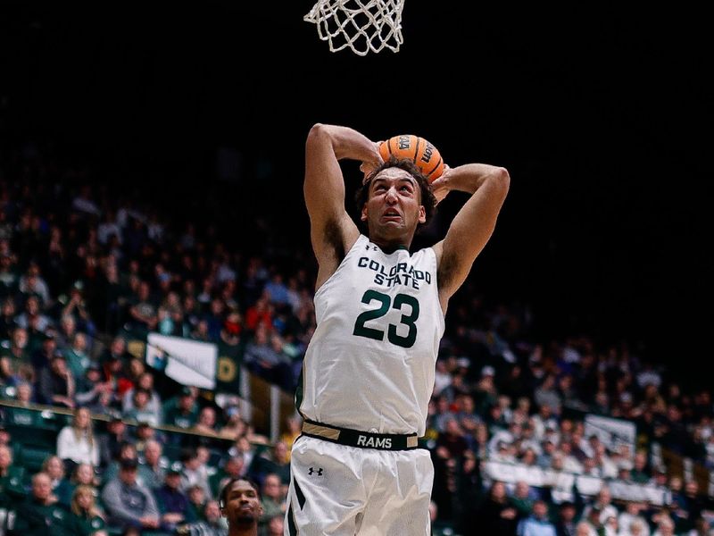 Feb 4, 2023; Fort Collins, Colorado, USA; Colorado State Rams guard Isaiah Rivera (23) dunks the ball in the second half against the Utah State Aggies at Moby Arena. Mandatory Credit: Isaiah J. Downing-USA TODAY Sports