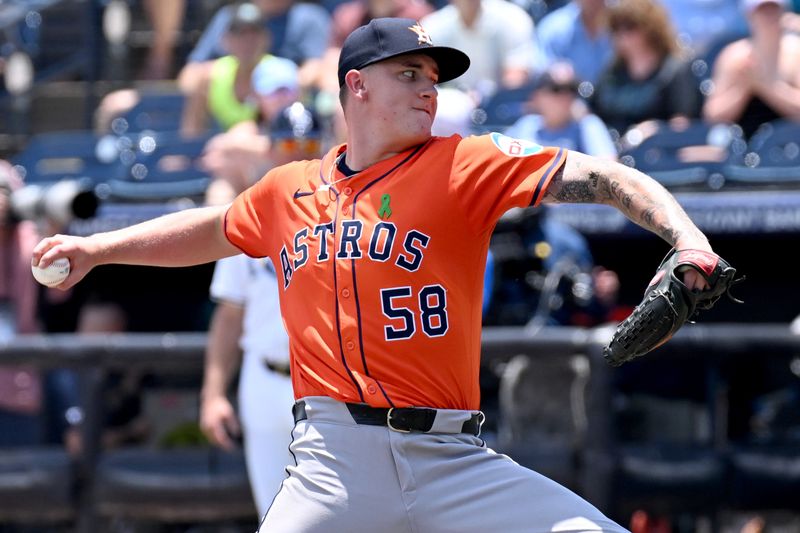 May 21, 2025; St. Petersburg, Florida, USA; Houston Astros starting pitcher Hunter Brown (58) throws a pitch in the first inning against the Tampa Bay Rays  at George M. Steinbrenner Field. Mandatory Credit: Jonathan Dyer-Imagn Images