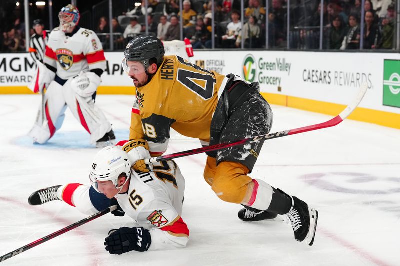 Jan 26, 2025; Las Vegas, Nevada, USA; Vegas Golden Knights center Tomas Hertl (48) checks Florida Panthers center Anton Lundell (15) during the second period at T-Mobile Arena. Mandatory Credit: Stephen R. Sylvanie-Imagn Images