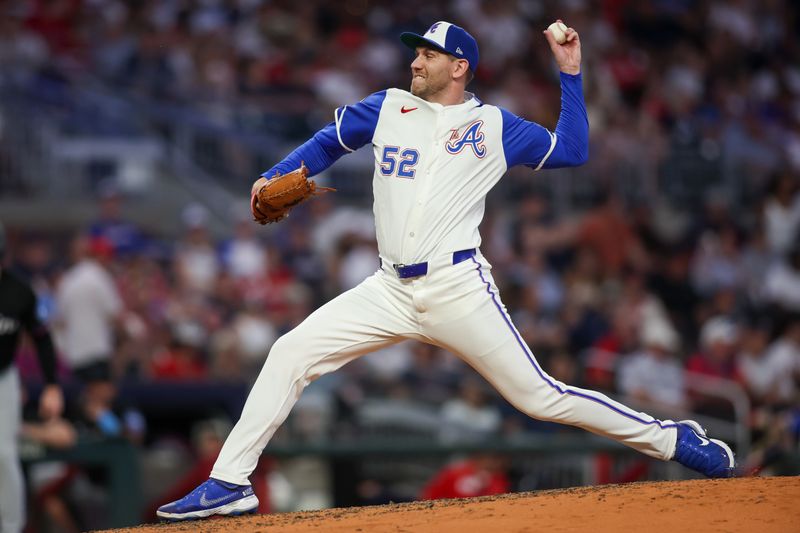 Aug 3, 2024; Atlanta, Georgia, USA; Atlanta Braves relief pitcher Dylan Lee (52) throws against the Miami Marlins in the fifth inning at Truist Park. Mandatory Credit: Brett Davis-USA TODAY Sports
