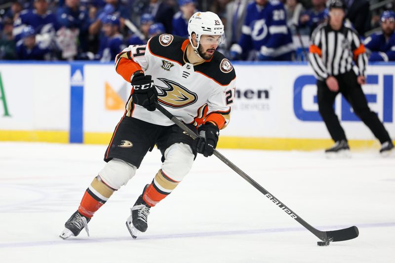 Jan 13, 2024; Tampa, Florida, USA;  Anaheim Ducks center Bo Groulx (24) controls the puck against the Tampa Bay Lightning in the second period at Amalie Arena. Mandatory Credit: Nathan Ray Seebeck-USA TODAY Sports