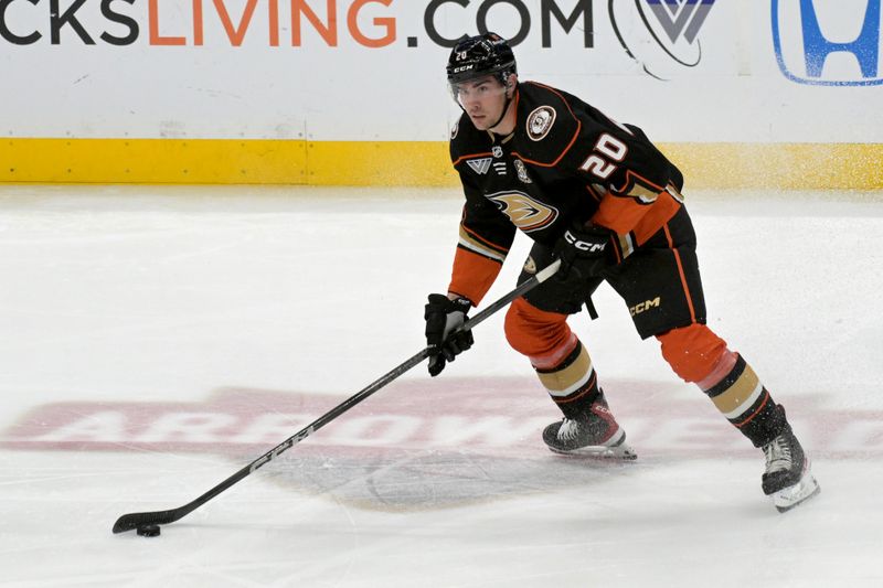 Mar 21, 2024; Anaheim, California, USA;  Anaheim Ducks right wing Brett Leason (20) handles the puck in the first period against the Chicago Blackhawks at Honda Center. Mandatory Credit: Jayne Kamin-Oncea-USA TODAY Sports