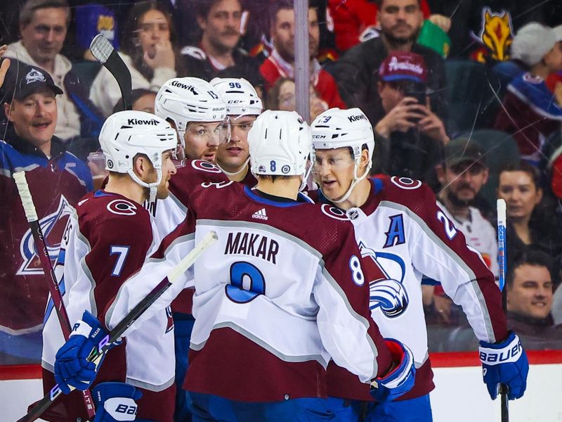 Mar 12, 2024; Calgary, Alberta, CAN; Colorado Avalanche right wing Valeri Nichushkin (13) celebrates his goal with teammates against the Calgary Flames during the second period at Scotiabank Saddledome. Mandatory Credit: Sergei Belski-USA TODAY Sports