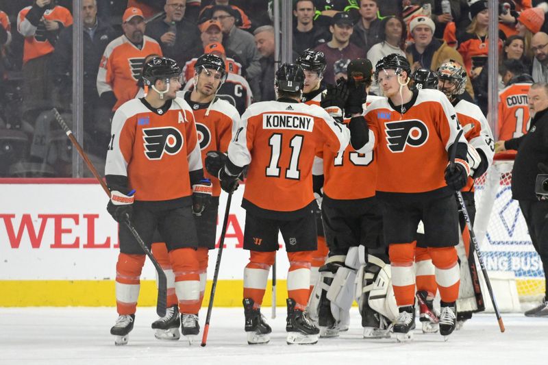 Jan 18, 2024; Philadelphia, Pennsylvania, USA; Philadelphia Flyers right wing Owen Tippett (74) celebrates win with teammates against the Dallas Stars at Wells Fargo Center. Mandatory Credit: Eric Hartline-USA TODAY Sports