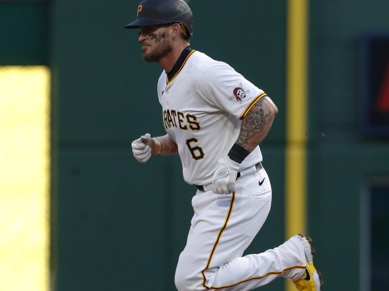 May 11, 2024; Pittsburgh, Pennsylvania, USA; Pittsburgh Pirates catcher Yasmani Grandal (6) runs the bases after hitting a three run home run against the Chicago Cubs during the fifth inning at PNC Park. Mandatory Credit: Charles LeClaire-USA TODAY Sports