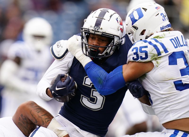 Sep 23, 2023; East Hartford, Connecticut, USA; UConn Huskies wide receiver Geordon Porter (3) runs the ball against Duke Blue Devils linebacker Cam Dillon (35) in the second quarter at Rentschler Field at Pratt & Whitney Stadium. Mandatory Credit: David Butler II-USA TODAY Sports