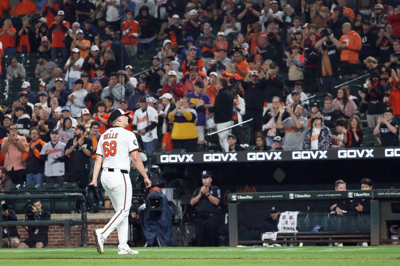 Sep 10, 2025; Baltimore, Maryland, USA; Baltimore Orioles pitcher Tyler Wells (68) walks off of the field during the seventh inning against the Pittsburgh Pirates at Oriole Park at Camden Yards. Mandatory Credit: Daniel Kucin Jr.-Imagn Images