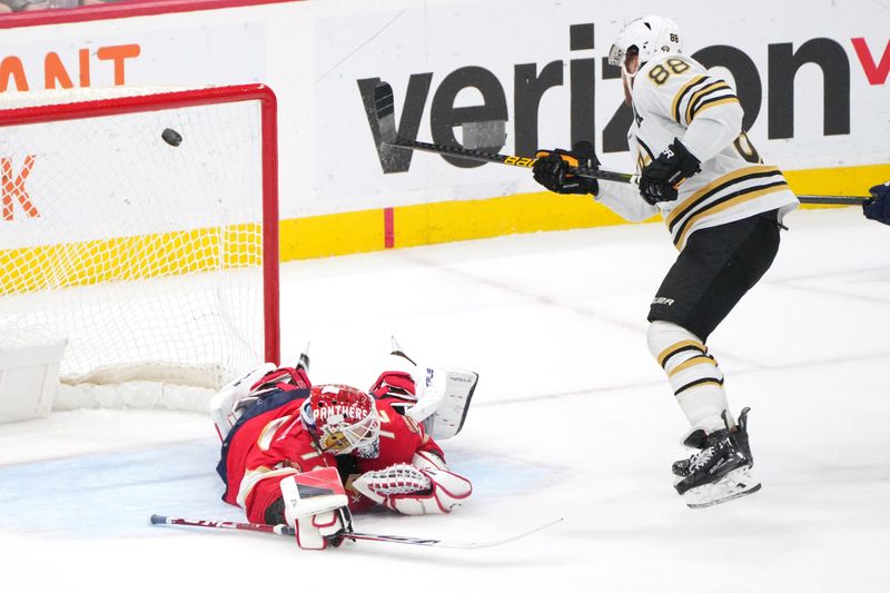 Mar 26, 2024; Sunrise, Florida, USA; Boston Bruins right wing David Pastrnak (88) scores on Florida Panthers goaltender Sergei Bobrovsky (72) during the second period at Amerant Bank Arena. Mandatory Credit: Jim Rassol-USA TODAY Sports