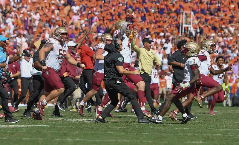 Sep 23, 2023; Clemson, South Carolina, USA; The Florida State Seminoles celebrates after defeating the Clemson Tigers in overtime at Memorial Stadium. Mandatory Credit: Ken Ruinard-USA TODAY Sports