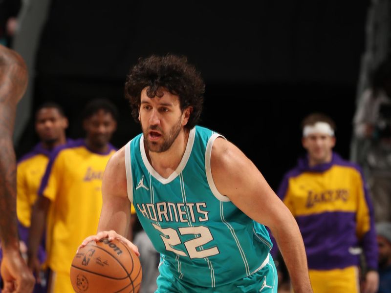 CHARLOTTE, NC - JANUARY 27:  Vasilije Micic #22 of the Charlotte Hornets  dribbles the ball during the game against the Los Angeles Lakers on January 27, 2025 at Spectrum Center in Charlotte, North Carolina. NOTE TO USER: User expressly acknowledges and agrees that, by downloading and or using this photograph, User is consenting to the terms and conditions of the Getty Images License Agreement. Mandatory Copyright Notice: Copyright 2025 NBAE (Photo by Kent Smith/NBAE via Getty Images)