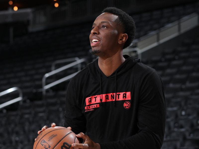 MILWAUKEE, WI - DECEMBER 4:   Onyeka Okongwu #17 of the Atlanta Hawks warms up before the game against the Milwaukee Bucks during a regular season game on December 4, 2024 at Fiserv Forum Center in Milwaukee, Wisconsin. NOTE TO USER: User expressly acknowledges and agrees that, by downloading and or using this Photograph, user is consenting to the terms and conditions of the Getty Images License Agreement. Mandatory Copyright Notice: Copyright 2024 NBAE (Photo by Gary Dineen/NBAE via Getty Images).