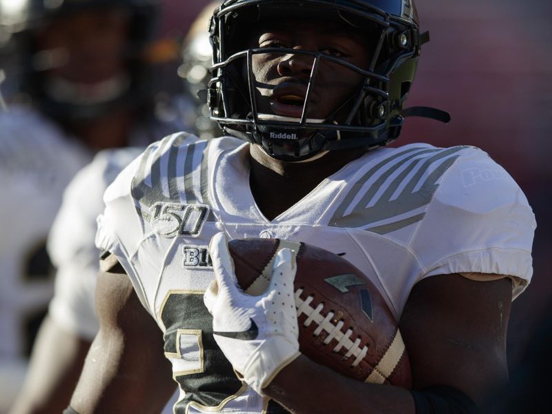 Nov 23, 2019; Madison, WI, USA; Purdue Boilermakers running back King Doerue (22) carries the football during warmups prior to the game against the Wisconsin Badgers at Camp Randall Stadium. Mandatory Credit: Jeff Hanisch-USA TODAY Sports