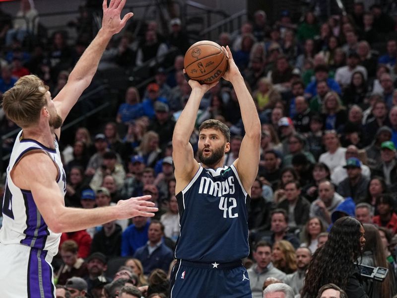 DALLAS, TX - JANUARY 27: Maxi Kleber #42 of the Dallas Mavericks shoots a three point basket during the game  on January 27, 2024 at the American Airlines Center in Dallas, Texas. NOTE TO USER: User expressly acknowledges and agrees that, by downloading and or using this photograph, User is consenting to the terms and conditions of the Getty Images License Agreement. Mandatory Copyright Notice: Copyright 2024 NBAE (Photo by Glenn James/NBAE via Getty Images)