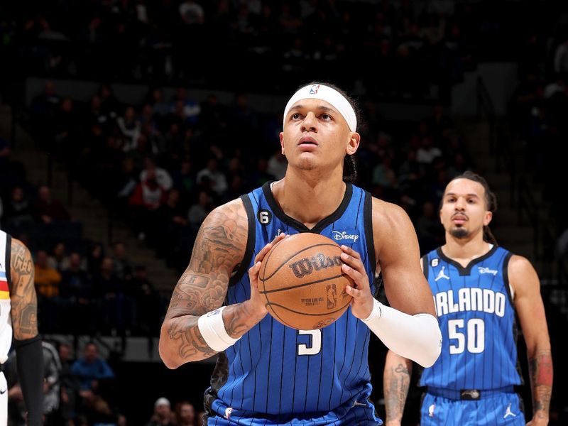 MINNEAPOLIS, MN -  FEBRUARY 3: Paolo Banchero #5 of the Orlando Magic prepares to shoot a free throw against the Minnesota Timberwolves on February 3, 2023 at Target Center in Minneapolis, Minnesota. NOTE TO USER: User expressly acknowledges and agrees that, by downloading and or using this Photograph, user is consenting to the terms and conditions of the Getty Images License Agreement. Mandatory Copyright Notice: Copyright 2023 NBAE (Photo by David Sherman/NBAE via Getty Images)