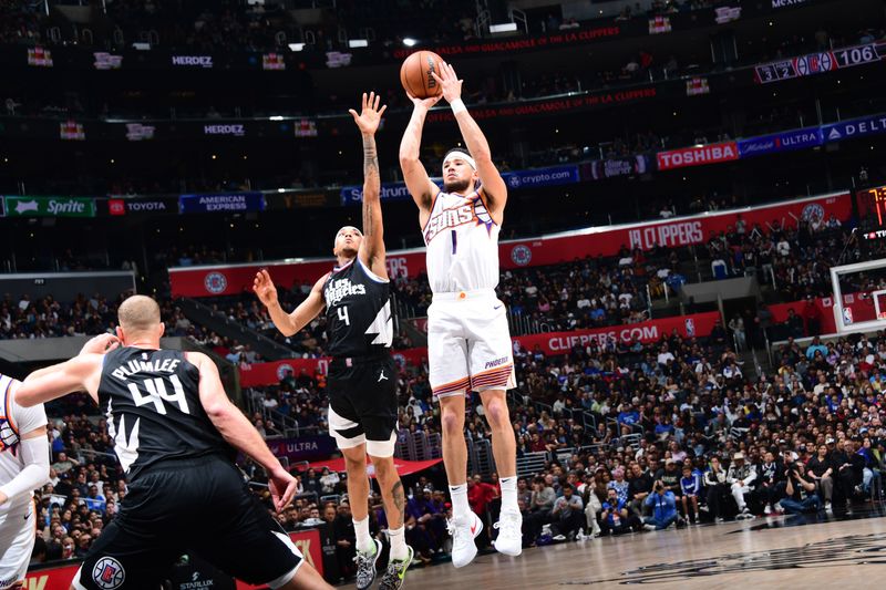 LOS ANGELES, CA - APRIL 10: Devin Booker #1 of the Phoenix Suns shoots the ball during the game against the LA Clippers on April 10, 2024 at Crypto.Com Arena in Los Angeles, California. NOTE TO USER: User expressly acknowledges and agrees that, by downloading and/or using this Photograph, user is consenting to the terms and conditions of the Getty Images License Agreement. Mandatory Copyright Notice: Copyright 2024 NBAE (Photo by Adam Pantozzi/NBAE via Getty Images)