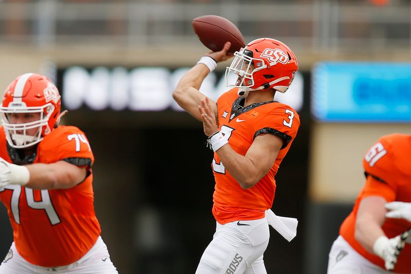 Nov 28, 2020; Oklahoma State Cowboys quarterback Spencer Sanders (3) throws a pass during a football game against Texas Tech at Boone Pickens Stadium. Mandatory Credit: Bryan Terry-USA TODAY Sports