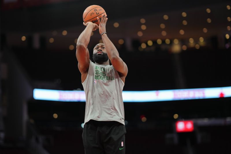 HOUSTON, TEXAS - JANUARY 21: Jaylen Brown #7 of the Boston Celtics shoots the ball during warmups prior to the game against the Houston Rockets at Toyota Center on January 21, 2024 in Houston, Texas. NOTE TO USER: User expressly acknowledges and agrees that, by downloading and or using this photograph, User is consenting to the terms and conditions of the Getty Images License Agreement. (Photo by Alex Bierens de Haan/Getty Images)