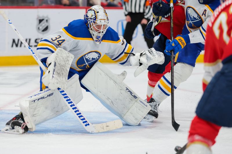Feb 2, 2026; Sunrise, Florida, USA; Buffalo Sabres goaltender Alex Lyon (34) defends his net against the Florida Panthers during the third period at Amerant Bank Arena. Mandatory Credit: Sam Navarro-Imagn Images