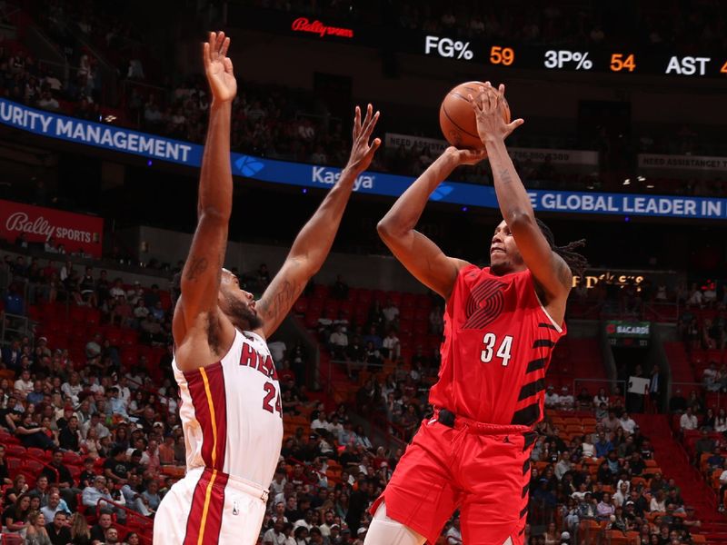 MIAMI, FL - MARCH 29: Jabari Walker #34 of the Portland Trail Blazers shoots the ball during the game against the Miami Heat on March 29, 2024 at Kaseya Center in Miami, Florida. NOTE TO USER: User expressly acknowledges and agrees that, by downloading and or using this Photograph, user is consenting to the terms and conditions of the Getty Images License Agreement. Mandatory Copyright Notice: Copyright 2024 NBAE (Photo by Issac Baldizon/NBAE via Getty Images)