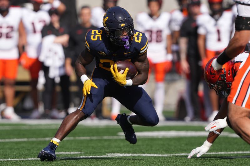 Oct 26, 2024; Berkeley, California, USA; California Golden Bears running back Jaivian Thomas (25) carries the ball against the Oregon State Beavers during the first quarter at California Memorial Stadium. Mandatory Credit: Darren Yamashita-Imagn Images