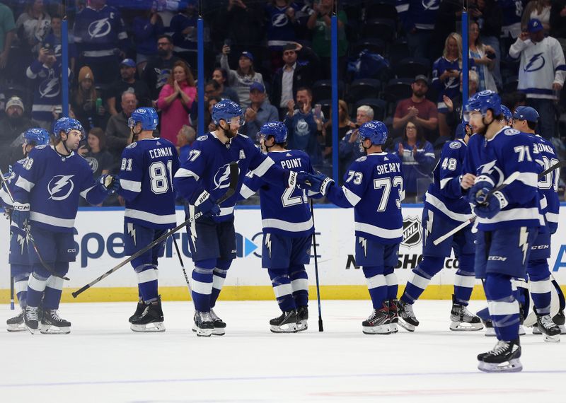 Oct 26, 2023; Tampa, Florida, USA; Tampa Bay Lightning defenseman Victor Hedman (77) and teammates celebrates after they beat the San Jose Sharks at Amalie Arena. Mandatory Credit: Kim Klement Neitzel-USA TODAY Sports