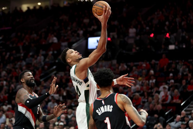 PORTLAND, OREGON - JANUARY 31: Giannis Antetokounmpo #34 of the Milwaukee Bucks shoots against the Portland Trail Blazers during the second quarter at Moda Center on January 31, 2024 in Portland, Oregon. (Photo by Steph Chambers/Getty Images)