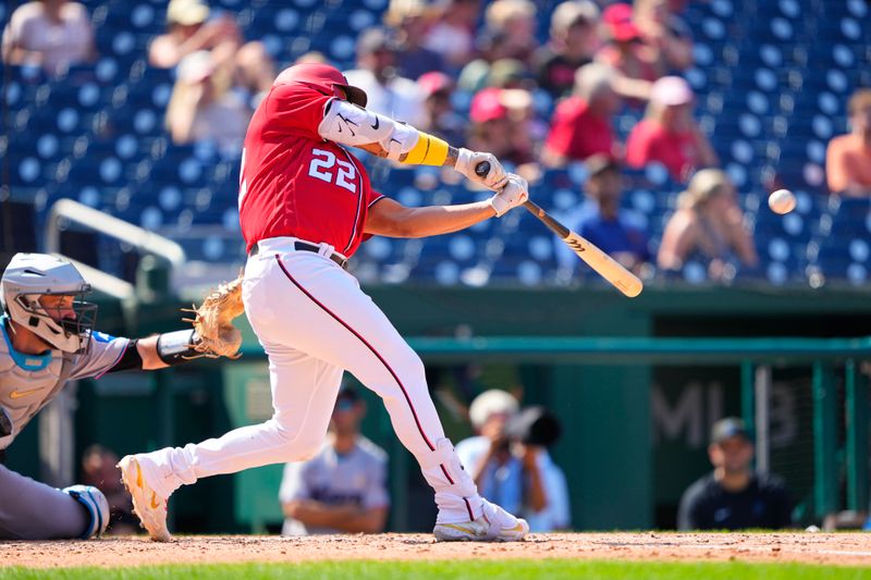 Sep 3, 2023; Washington, District of Columbia, USA;  Washington Nationals first baseman Dominic Smith (22) hits an RBI double against the Miami Marlins during the fifth inning at Nationals Park. Mandatory Credit: Gregory Fisher-USA TODAY Sports