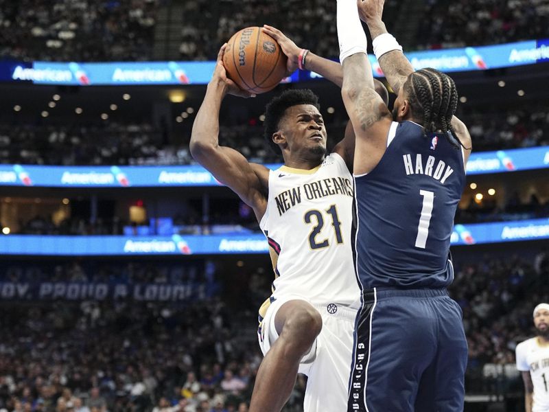 DALLAS, TX - November 19: Yves Missi #21 of the New Orleans Pelicans drives to the basket during the NBA Cup game against the Dallas Mavericks on November 19, 2024 at American Airlines Center in Dallas, Texas. NOTE TO USER: User expressly acknowledges and agrees that, by downloading and or using this photograph, User is consenting to the terms and conditions of the Getty Images License Agreement. Mandatory Copyright Notice: Copyright 2024 NBAE (Photo by Glenn James/NBAE via Getty Images)tt