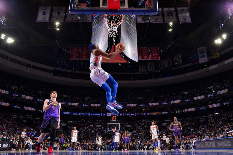 PHILADELPHIA, PA - JANUARY 28:  Ricky Council IV #14 of the Philadelphia 76ers dunks the ball during the game against the Los Angeles Lakers on January 28, 2025 at the Wells Fargo Center in Philadelphia, Pennsylvania NOTE TO USER: User expressly acknowledges and agrees that, by downloading and/or using this Photograph, user is consenting to the terms and conditions of the Getty Images License Agreement. Mandatory Copyright Notice: Copyright 2025 NBAE (Photo by Jesse D. Garrabrant/NBAE via Getty Images)