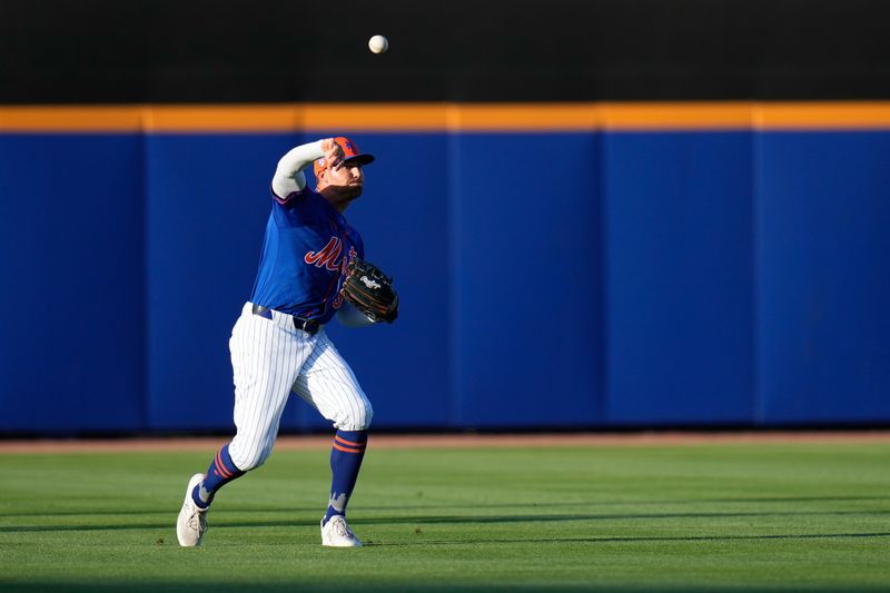 Mar 19, 2024; Port St. Lucie, Florida, USA; New York Mets center fielder Brandon Nimmo (9) throws the ball to first against the St. Louis Cardinals during the second inning at Clover Park. Mandatory Credit: Rich Storry-USA TODAY Sports