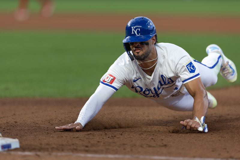 Aug 6, 2024; Kansas City, Missouri, USA; Kansas City Royals outfielder MJ Melendez (1) dives back to first base during the fourth inning against the Boston Red Sox at Kauffman Stadium. Mandatory Credit: William Purnell-USA TODAY Sports