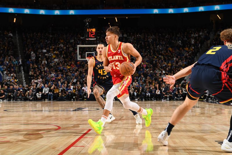 SAN FRANCISCO, CA - NOVEMBER 20: Bogdan Bogdanovic #13 of the Atlanta Hawks drives to the basket during the game against the Golden State Warriors on November 20, 2024 at Chase Center in San Francisco, California. NOTE TO USER: User expressly acknowledges and agrees that, by downloading and or using this photograph, user is consenting to the terms and conditions of Getty Images License Agreement. Mandatory Copyright Notice: Copyright 2024 NBAE (Photo by Noah Graham/NBAE via Getty Images)