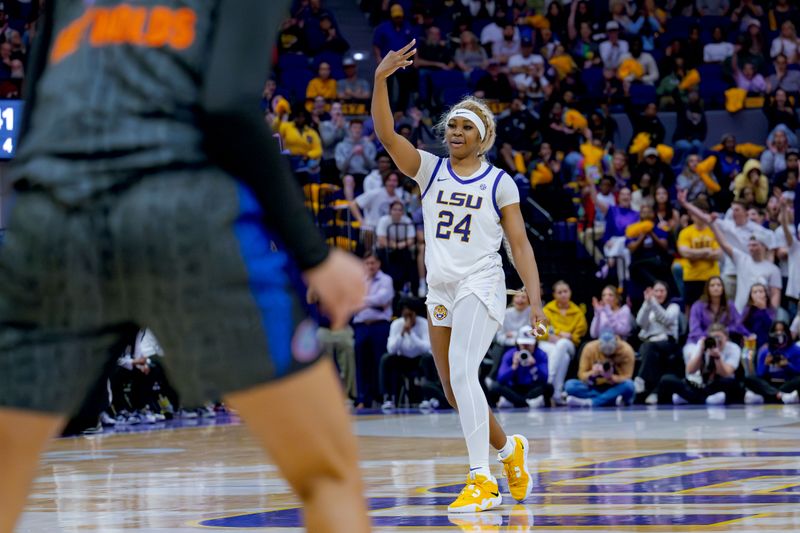 Feb 4, 2024; Baton Rouge, Louisiana, USA; LSU Lady Tigers guard Aneesah Morrow (24) celebrates a three point basket against the Florida Gators during the second half at Pete Maravich Assembly Center. Mandatory Credit: Matthew Hinton-USA TODAY Sports