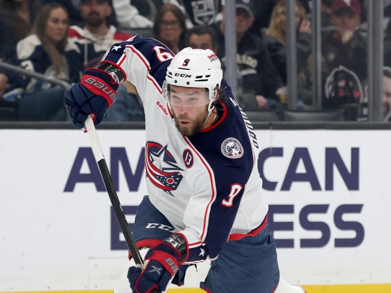 Nov 9, 2024; Los Angeles, California, USA; Columbus Blue Jackets defenseman Ivan Provorov (9) shoots during the first period against the Los Angeles Kings at Crypto.com Arena. Mandatory Credit: Jason Parkhurst-Imagn Images