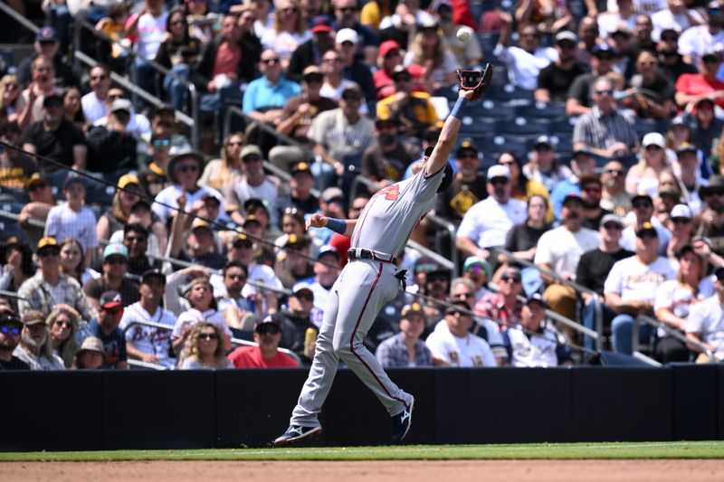 Apr 19, 2023; San Diego, California, USA; Atlanta Braves third baseman Austin Riley (27) catches a pop-up in foul territory hit by San Diego Padres center fielder Trent Grisham (not pictured) during the third inning at Petco Park. Mandatory Credit: Orlando Ramirez-USA TODAY Sports