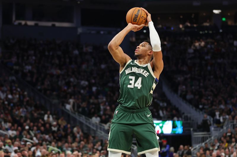 MILWAUKEE, WISCONSIN - DECEMBER 21: Giannis Antetokounmpo #34 of the Milwaukee Bucks takes a shot during a game against the Orlando Magic at Fiserv Forum on December 21, 2023 in Milwaukee, Wisconsin. NOTE TO USER: User expressly acknowledges and agrees that, by downloading and or using this photograph, User is consenting to the terms and conditions of the Getty Images License Agreement. (Photo by Stacy Revere/Getty Images)