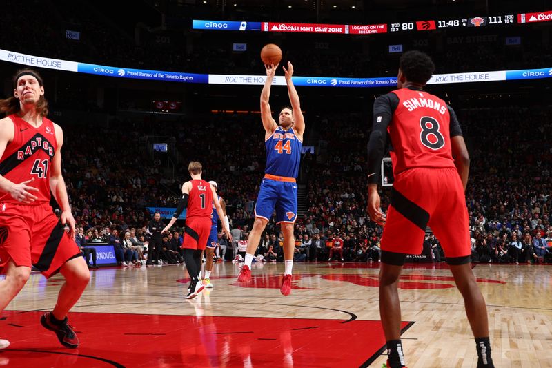 TORONTO, CANADA - MARCH 27: Bojan Bogdanovic #44 of the New York Knicks shoots the ball during the game against the Toronto Raptors on March 27, 2024 at the Scotiabank Arena in Toronto, Ontario, Canada.  NOTE TO USER: User expressly acknowledges and agrees that, by downloading and or using this Photograph, user is consenting to the terms and conditions of the Getty Images License Agreement.  Mandatory Copyright Notice: Copyright 2024 NBAE (Photo by Vaughn Ridley/NBAE via Getty Images)