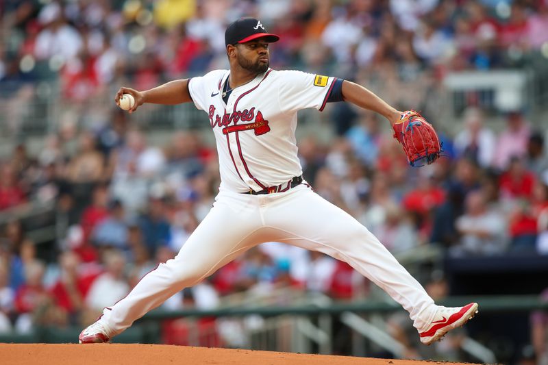 Jul 22, 2024; Atlanta, Georgia, USA; Atlanta Braves starting pitcher Reynaldo Lopez (40) throws against the Cincinnati Reds in the second inning at Truist Park. Mandatory Credit: Brett Davis-USA TODAY Sports
