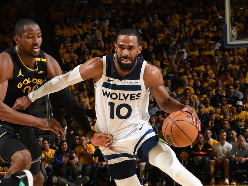 SAN FRANCISCO, CA - MAY 12: Mike Conley #10 of the Minnesota Timberwolves drives to the basket during the game against the Golden State Warriors during Round Two Game Four of the 2025 NBA Playoffs on MAY 12, 2025 at Chase Center in San Francisco, California. NOTE TO USER: User expressly acknowledges and agrees that, by downloading and or using this photograph, user is consenting to the terms and conditions of Getty Images License Agreement. Mandatory Copyright Notice: Copyright 2025 NBAE (Photo by Noah Graham/NBAE via Getty Images)
